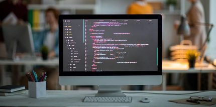 laptop screen filled with code