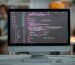 laptop screen filled with code